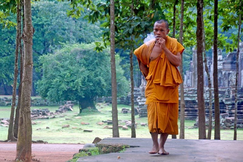 Smoking monk Cambodia travel