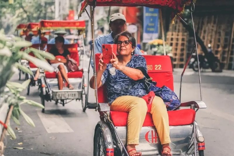 tourist-on-cyclo-ride-in-vietnam