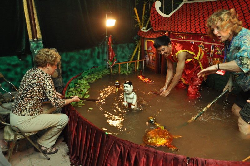 tourist join performing water puppet tourists join performing water puppet vietnam tours