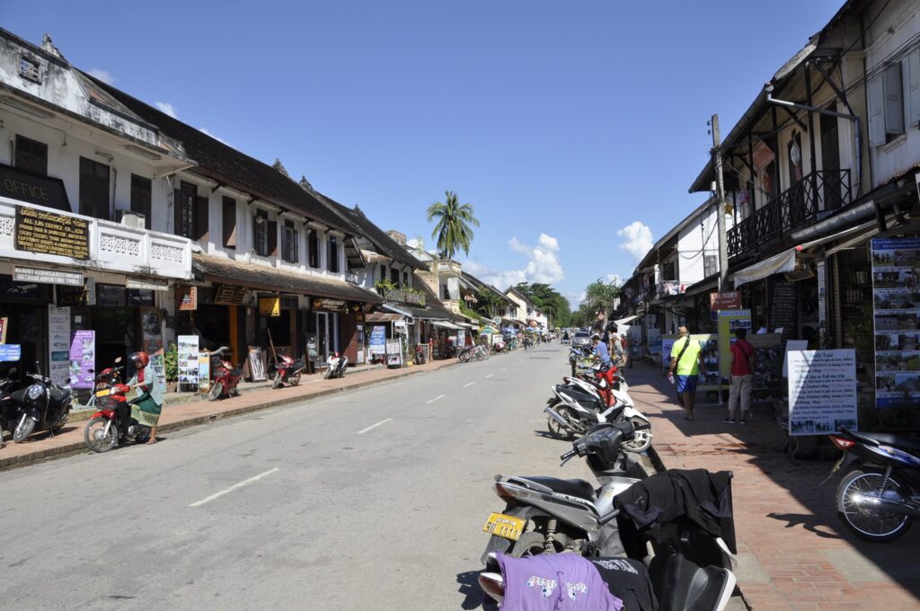 The unhurried pace of the main street in Luang Prabang