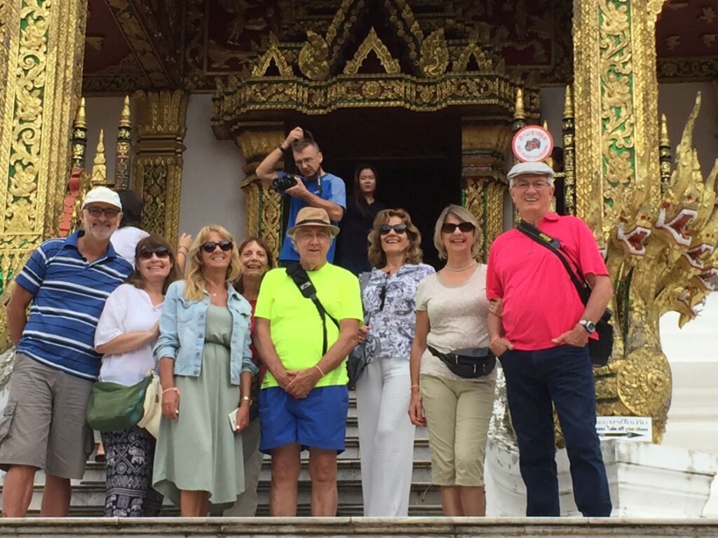 Nadova Tours clients at Haw Pha Bang, the golden temple of the Royal Palace of Luang Prabang